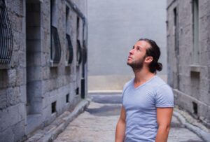 confused man looking upwards